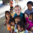 Michelle with kids in the Amazon